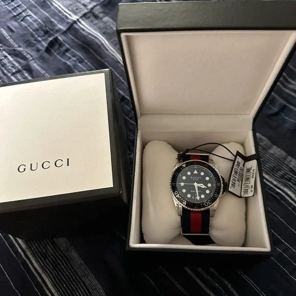 Gucci Men's watch with signature red and blue band - Picture 1 of 4